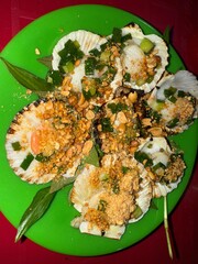 So diep nuong mo hanh grilled scallop with onion spring oil and cheese crushed roasted peanuts and...