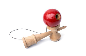 Vintage Old toys that have been played with there are traces damage of play. Cup and ball game Kendama traditional wooden japanese skill toy isolated on white background.