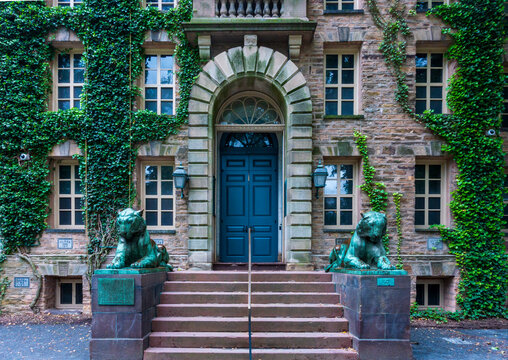 Princeton, NJ - US - May 31, 2025 Ivy-clad Nassau Hall, Princeton&rsquo;s oldest building, features stone architecture and iconic bronze tiger statues guarding the entrance, symbols of pride and legacy.