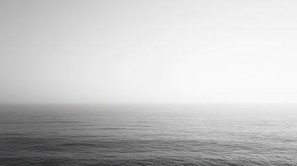 Fototapeta premium Monochromatic serenity: Abstract ocean view under soft diffused light