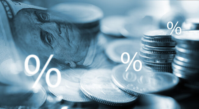 Finance and investment background. Money and USD currency bank note, compound interest rate percentage on investment, dividends, tax tarrif, world economic growth