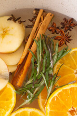 cinnamon, rosemary, oranges, apple, cloves and star anise in a simmer pot for natural aromatherapy