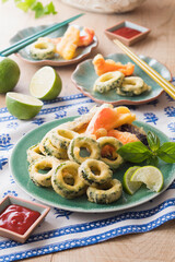 【ゴーヤのフリッター】夏野菜の王様ゴーヤのフリッター。夏の仲間パプリカとナスのフリッターも添えました。ライムたっぷり絞って楽しみます。