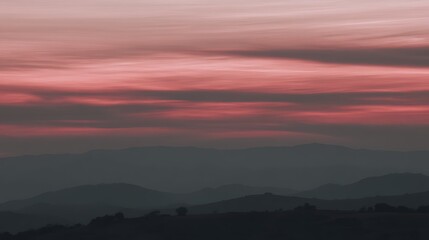 Fototapeta premium Pink sky over mountain range