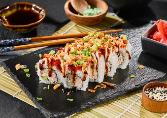 Crab and cucumber sushi roll with tobiko, spicy sauce, and fried onion, vibrant lighting, crisp color mood