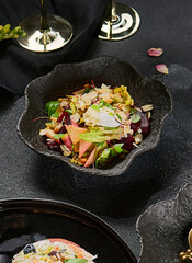 Beetroot, apple, and cheese salad in matte ceramic bowl, moody lighting, top-down fine dining scene