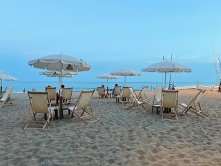 beach chairs and umbrellas