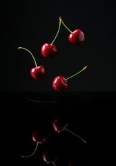 Fresh red cherries dark background cherry fruit healthy food sweet dessert