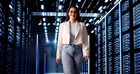 Professional Woman Configuring Server Network In Data Management Center