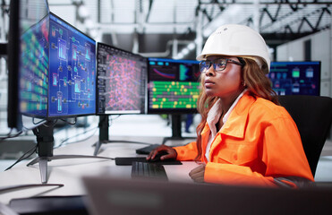 African American Woman Operates SCADA Screen