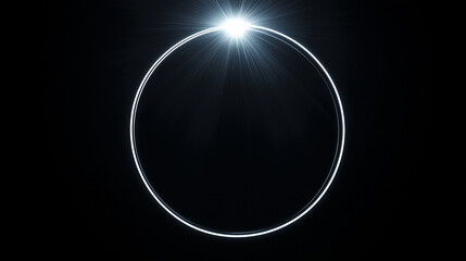 A luminous ring with a bright light at the top against a stark black background creating contrast