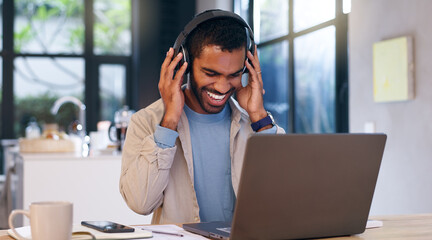 Remote work, happy man and laptop in home with music, productivity or positive feedback for...