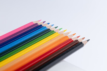 colored pencils on white background