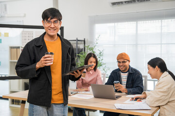 Asian business start up freelance people team analyzing statistics financial. Group Team of...