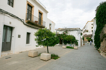 Streets and views of the ancient walled citadel of Dalt Vila, a UNESCO World Heritage Site, on the island of Ibiza in Spain.