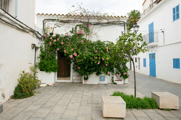 Streets and views of the ancient walled citadel of Dalt Vila, a UNESCO World Heritage Site, on the island of Ibiza in Spain.