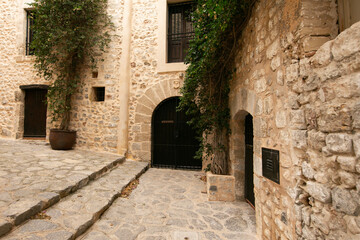 Streets and views of the ancient walled citadel of Dalt Vila, a UNESCO World Heritage Site, on the island of Ibiza in Spain.