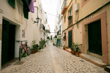 Streets and views of the ancient walled citadel of Dalt Vila, a UNESCO World Heritage Site, on the island of Ibiza in Spain.