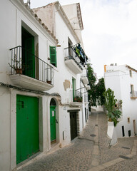 Streets and views of the ancient walled citadel of Dalt Vila, a UNESCO World Heritage Site, on the island of Ibiza in Spain.