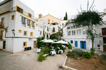 Streets and views of the ancient walled citadel of Dalt Vila, a UNESCO World Heritage Site, on the island of Ibiza in Spain.