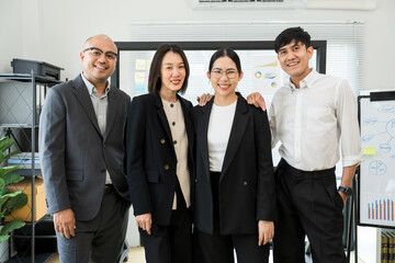 Asian business people team analyzing statistics financial. Group Team of ceo business man and woman...