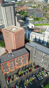 High Angle Footage of Greater Manchester Central City During Sunset, England Great Britain. Drone Camera Footage Was Captured During Cloudy Sunset Time on May 4th, 2024