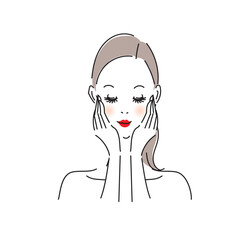 丁寧にスキンケアをする美しい女性