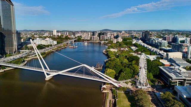 The Neville Bonner Bridge, Brisbane CBD, Queensland, Australia: Aerial Image of Modern City Skyline, Skyscrapers, Brisbane River, Urban Infrastructure, Bridges, and Waterfront, and South Bank
