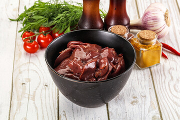 Raw chicken liver uncooked in the bowl