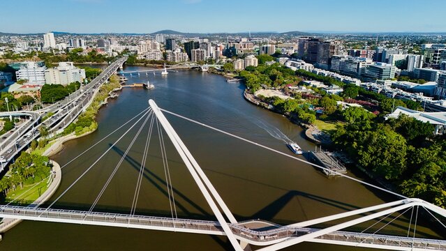 The Neville Bonner Bridge, Brisbane CBD, Queensland, Australia: Aerial Image of Modern City Skyline, Skyscrapers, Brisbane River, Urban Infrastructure, Bridges, and Waterfront, and South Bank
