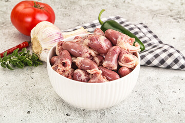 Fresh raw chicken hearts in the bowl