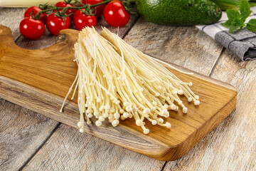 Raw enoki mushroom for cooking