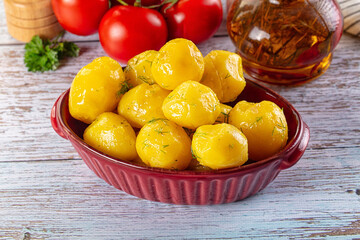 Boiled young potato with oil