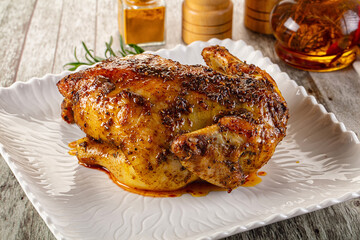 Baked in oven whole chicken with spices