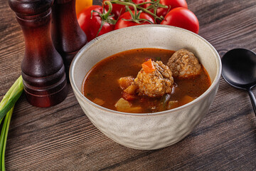 Tomato Soup with meatballs and vegetables
