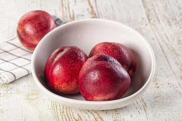 Ripe sweet juicy nectarines heap