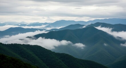Obraz premium Mountain Range with Low Clouds