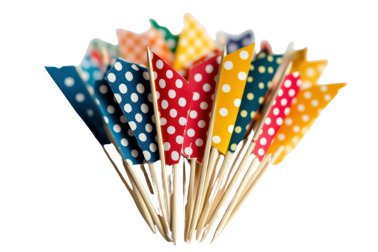 Colorful party toothpicks with polka dot paper flags, cheerful and festive for decorating snacks or themed event celebrations.


