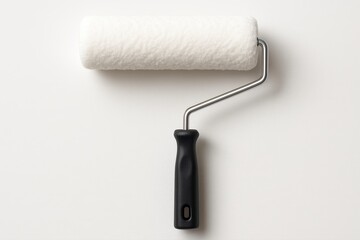Fototapeta premium Paint Roller Close-up on White Background for Home Improvement Projects