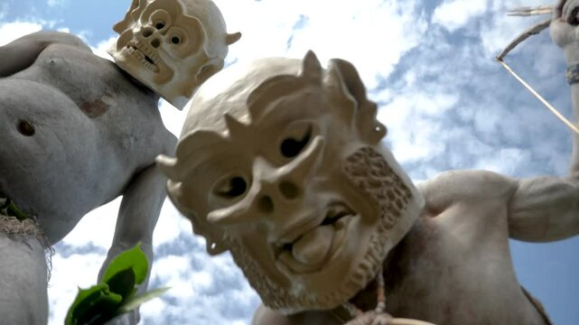Asaro Mudmen tribe bow hunting. Papuan tribe dance. Mount Hagen tribe festival. Cultural event. Indigenous men in native costumes. High quality 4k footage