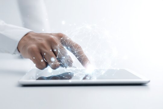Close-up of a man hand interacting with a tablet device representing modern technology digital communication and online business tools. - Powered by Adobe