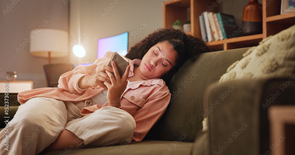 Poster Woman, bored and phone with texting on sofa, tired and doom scroll with subscription on social media. Girl, smartphone and click on mobile app at night, chat and annoyed on couch in lounge at house