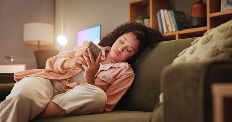Woman, bored and phone with texting on sofa, tired and doom scroll with subscription on social...