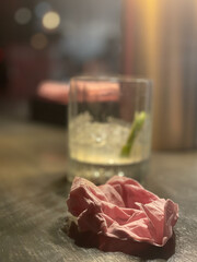 Foreground Napkin with Cocktail Glass Bokeh