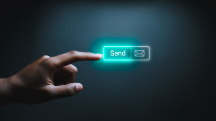 Email Send: Close-up of a hand pressing the luminous "Send" button, a modern digital concept symbolizing email communication, electronic messaging and the power of connection.