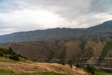 Fototapeta premium Caucasian mountain. Dagestan. Trees, rocks, mountains, view of the green mountains. Beautiful summer landscape.