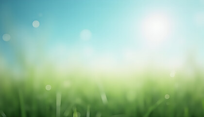 Obraz premium Blurred spring meadow scene shows bright blue sky blending into vibrant green grass.