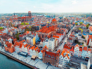 Gdansk with Motlawa river in Poland. Aerial landscape of the Main Town. Old town colourful house with saint Marys church