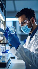 Detailed scientist working in laboratory analyzing bacteria in petri dish at scientific research center