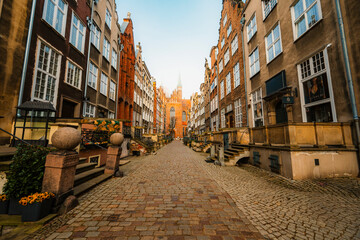 Gdansk with Motlawa river in Poland. Old town colourful house with church and Mariacka street © Zedspider